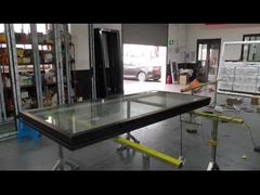 Cadre de puits en aluminium électrique Rochette en aluminium à pente personnalisée Vitres modernes